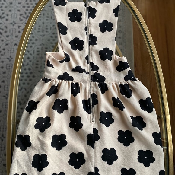 Cream and Black Floral Mini Dress with Cut out sides, sinch waist and skirt - Picture 6 of 7